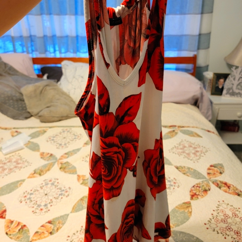 Tank top, floral, white and red, hanging off neck, v cut.